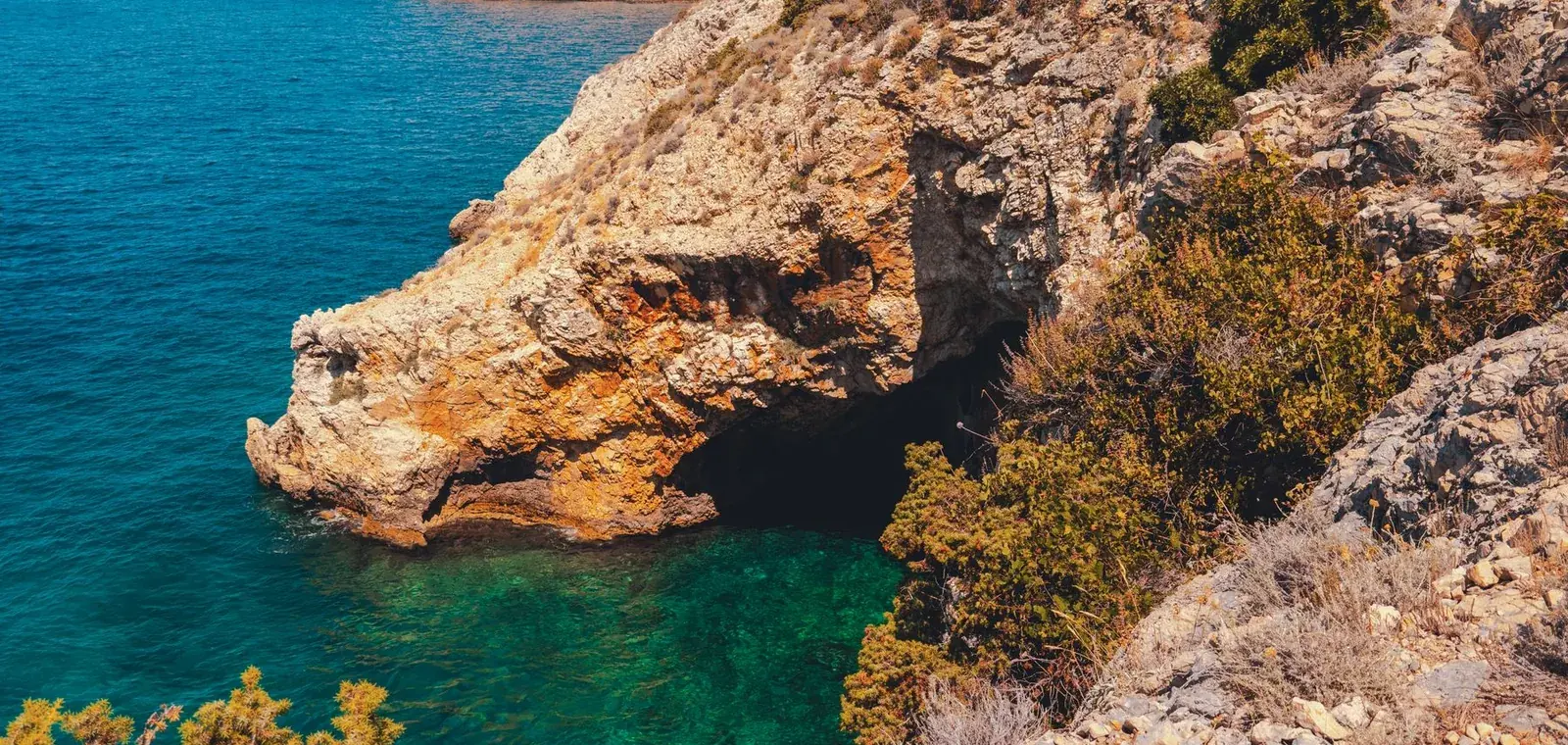 Rocky coastline and a clear turquoise cove on the island of Krk, Kvarner, Croatia